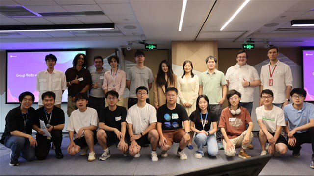 a group of people posing for a photo