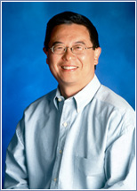 a man smiling for the camera