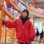 a woman smiling for the camera