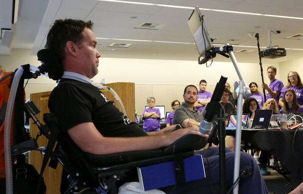 a group of people sitting in chairs