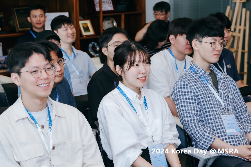 a group of people posing for a photo
