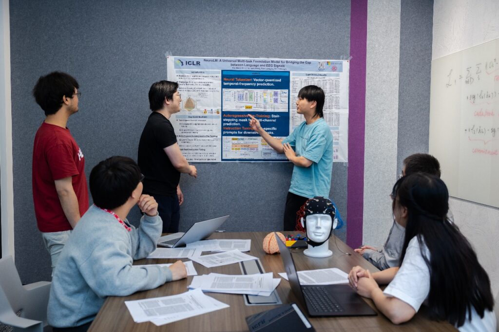 a group of people in a meeting
