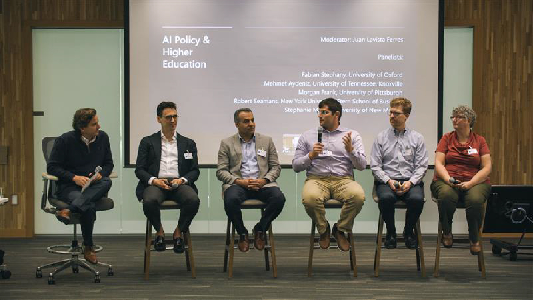 a group of people sitting in chairs