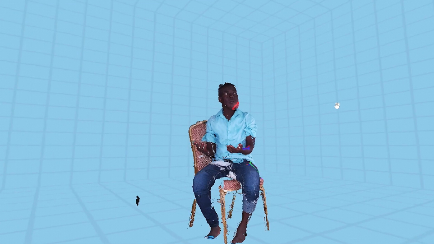 An image from the 3D Telecommunications software of a patient in the 3D Telemedicine system (a man sitting on a chair)