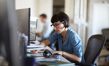 Image of a worker in her office.