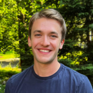 Blake Bullwinkel, trees in background.