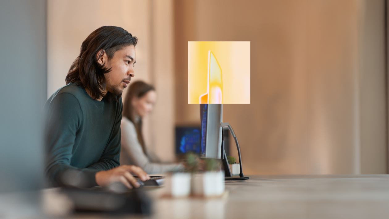A man sitting at a computer.