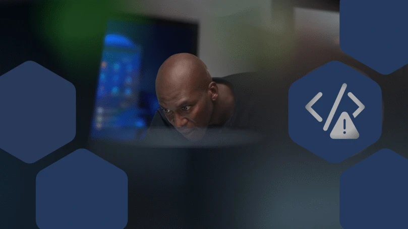 Close-up view of focused CISO (chief information security officer) at work in a security operations center.