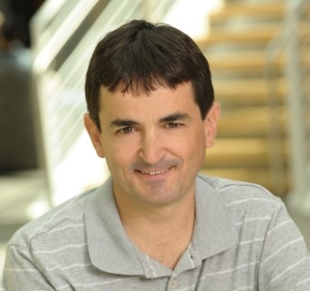 a person smiling for the camera