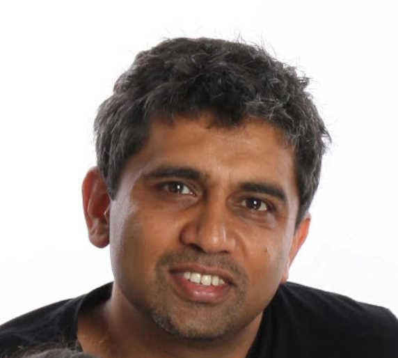 a man smiling for the camera