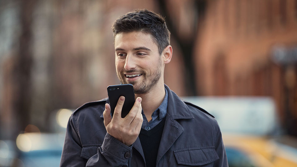 A man talks on his phone