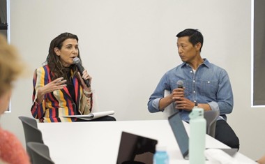 Adults presenting to group.