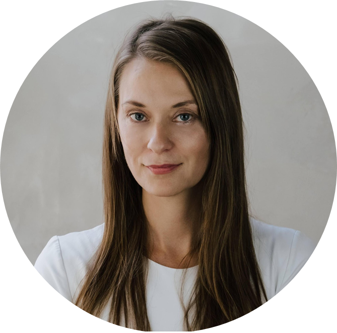 headshot of woman in white shirt