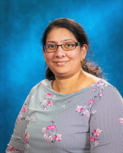 Digumarthi smiles in a corporate photo.