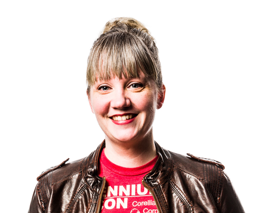 McCarty smiles in a portrait photo.