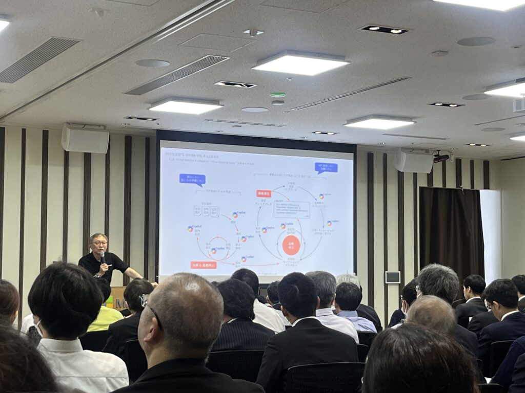 a person giving a presentation to an audience