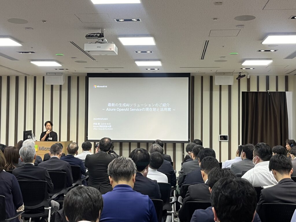 a person giving a presentation to an audience