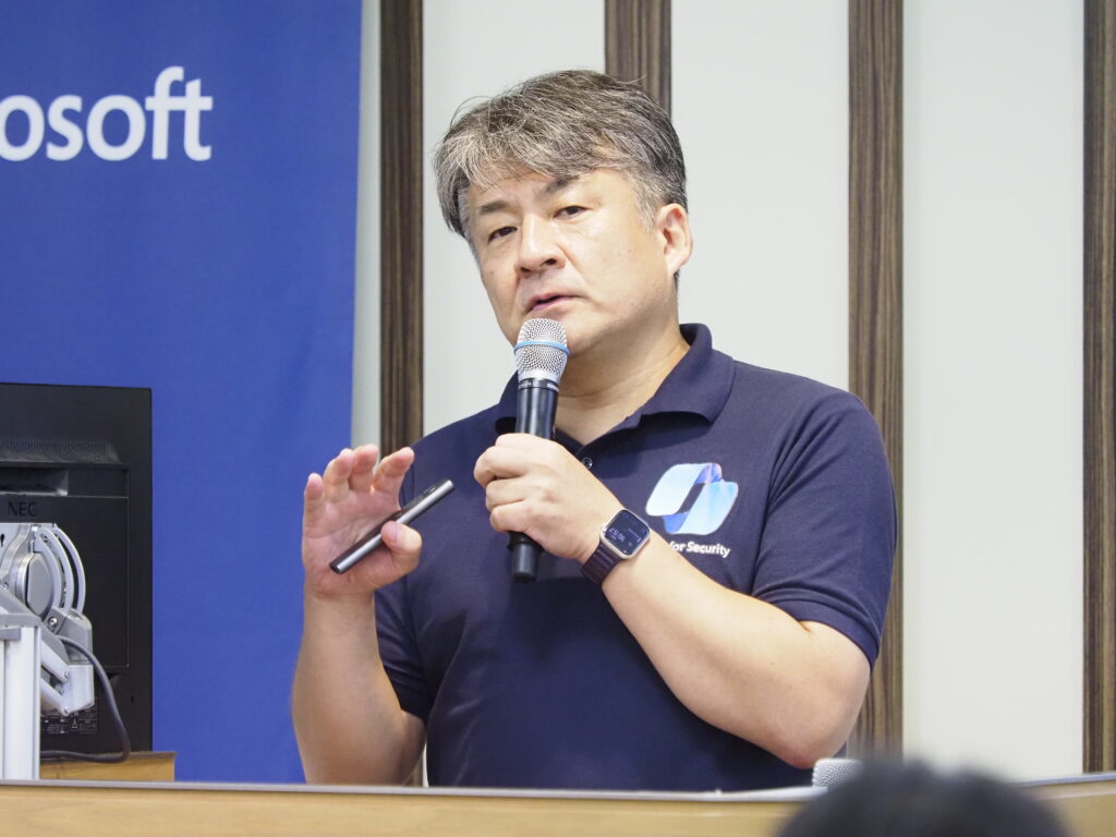 a person speaking into a microphone