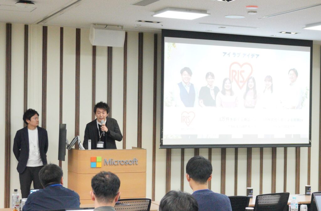 A man standing at a podium speaking into a microphone