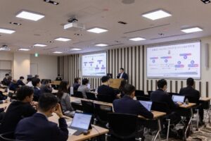 A group of people sitting at tables in a room