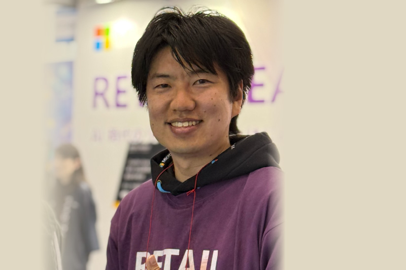 A man smiling at camera